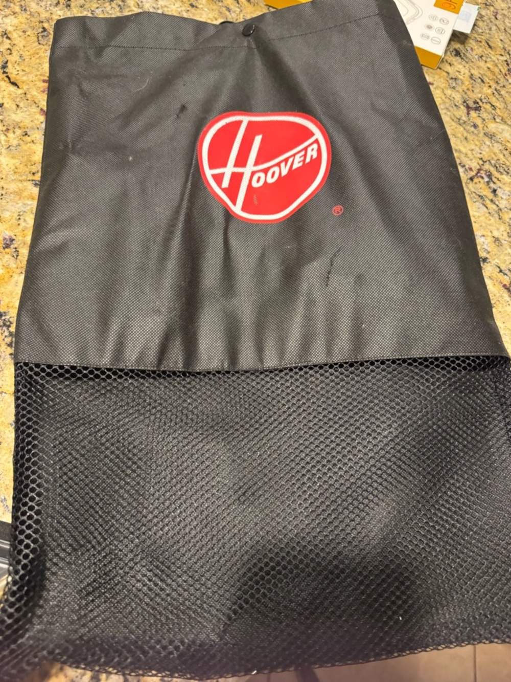 Hoover Power scrub Black Vacuum Accessory Bag with vacuum tools and manual.